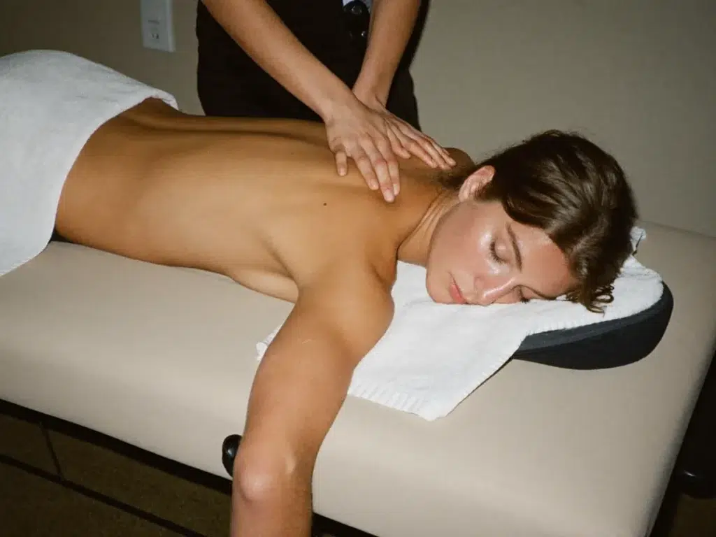Portable Table vs Floor Mattress in Bangkok Hotel Rooms A relaxing back oil massage on a portable massage table with the client face down and draped