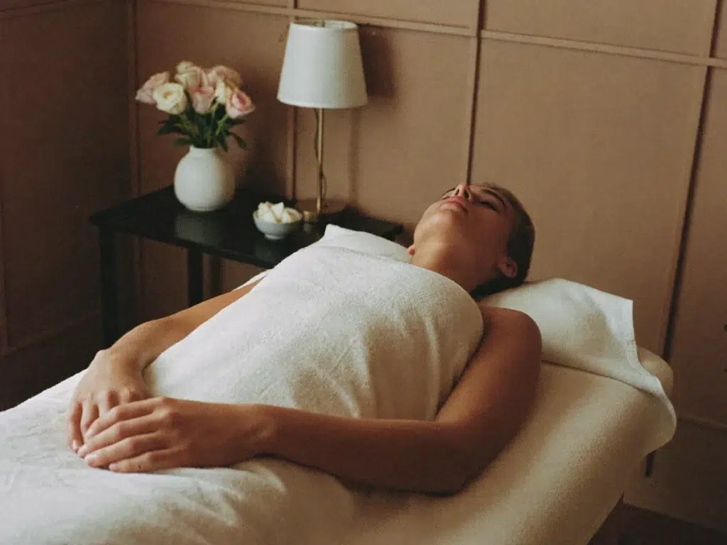 Deep Tissue Massage in Bangkok: Is It Right for You? A calm client resting peacefully after a deep tissue massage in a warm room
